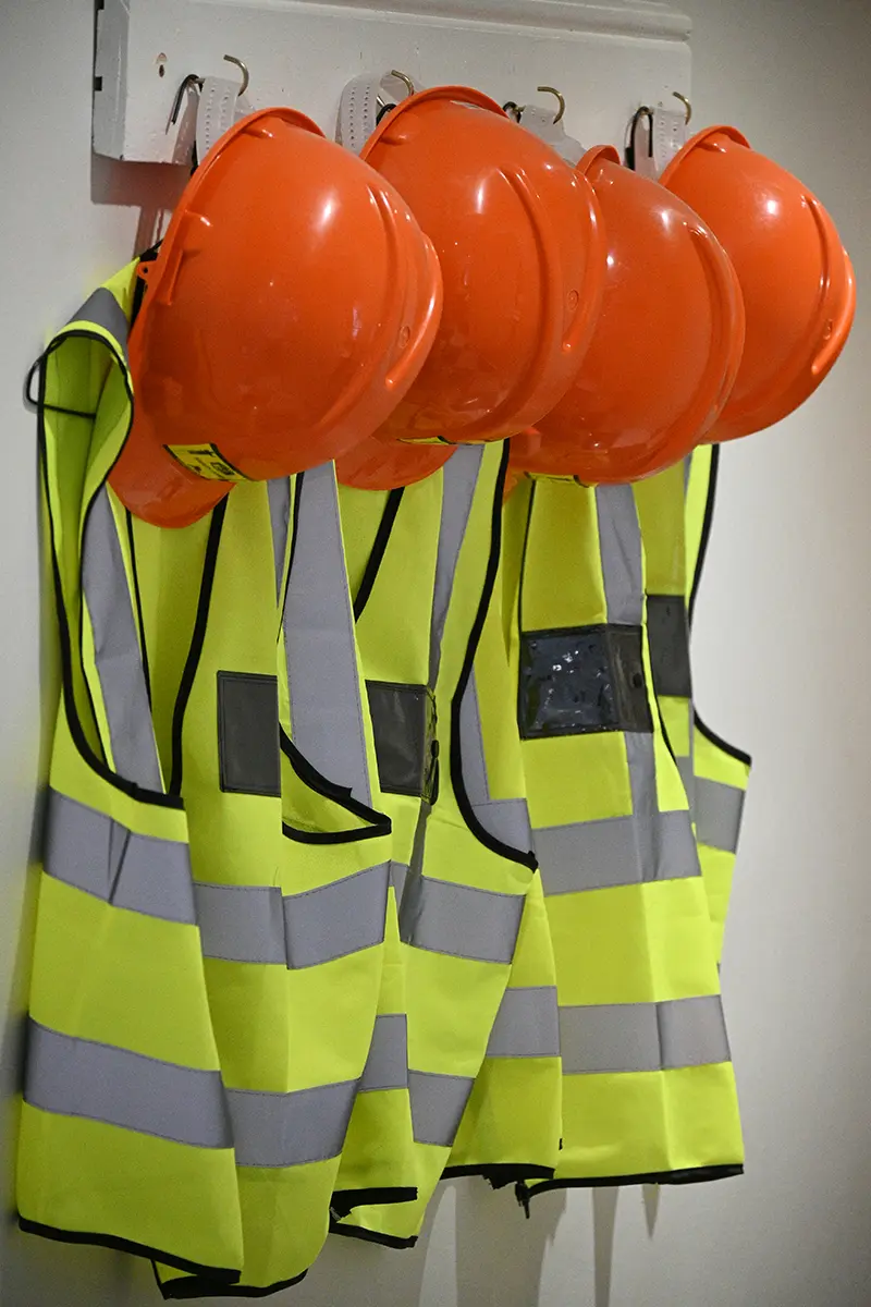 Safety equipment - hard hats and high-visibility vests